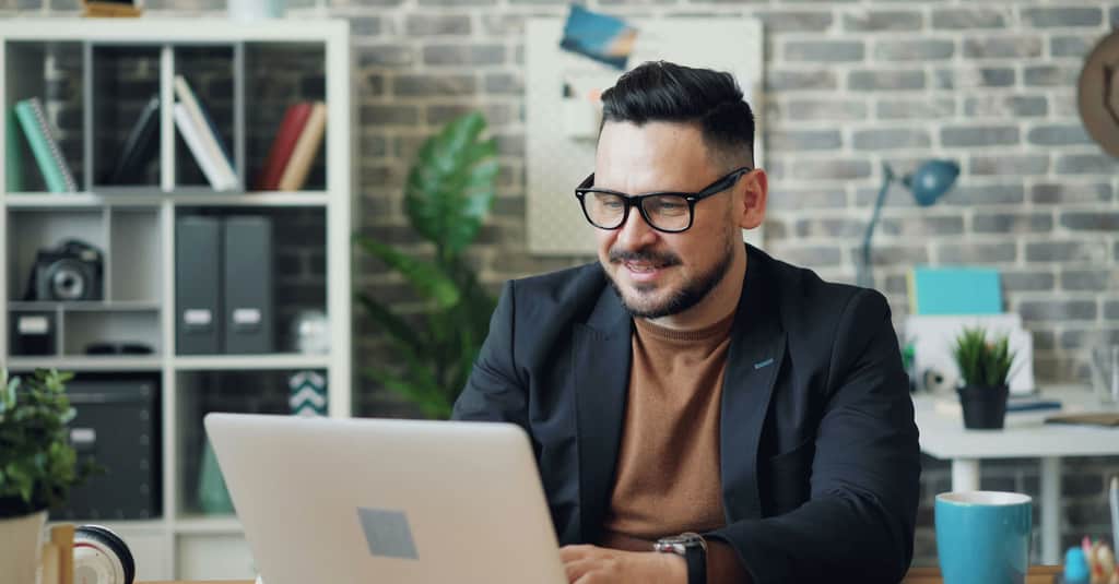 man with laptop large 2560 x 1338 jpg