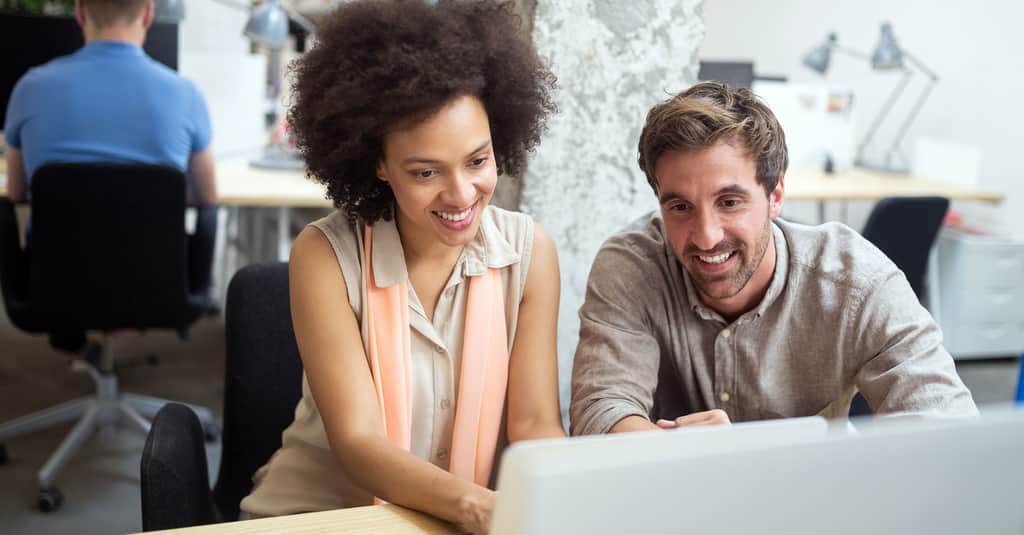 smiling people with laptop large teaser 2560 x 1338